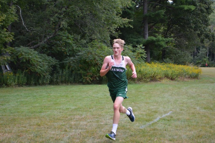 Marty Steucek running into the finish during September 10ths cross country meet against North Middlesex. Steucek finished 7th for the team with a time of 18:24. The cross country course was 2.8 miles.