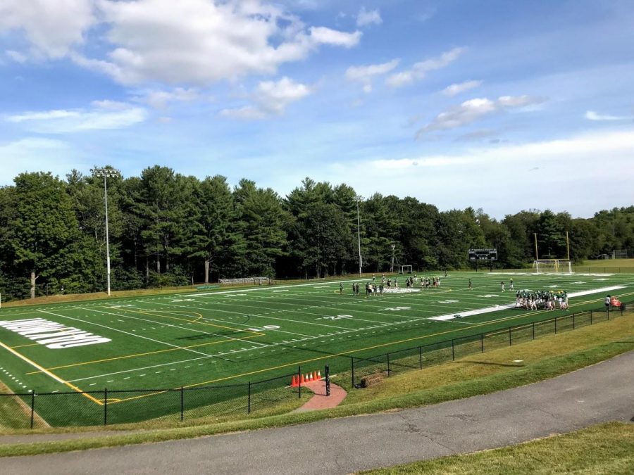 Football+team+practicing+on+new+turf