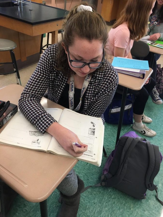 Sophomore, Ava Bottone, does work in Spanish class. Photo by Mollie Quill