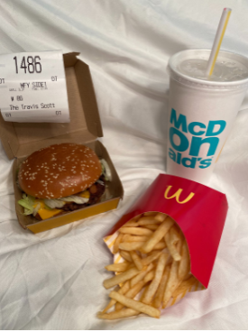 Fancy picture of Travis Scott burger, fries, and a Sprite
