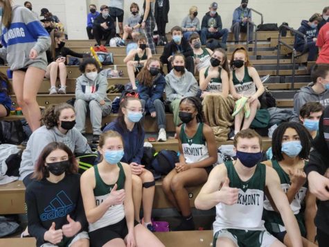 Indoor Track team members waiting for their turn to race. 