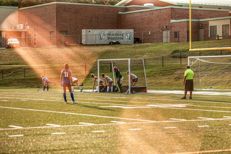 Action shot from a corner during a JV Field Hockey game. 