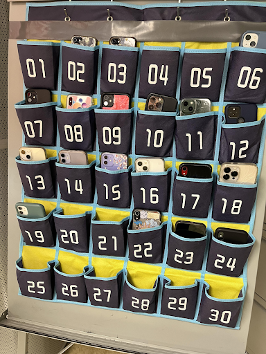Students phones placed in a numbered caddy at Oakmont Regional High School
