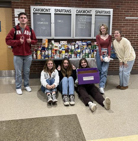 NHS Members Pose for a photo while dropping off their food from their homerooms. 