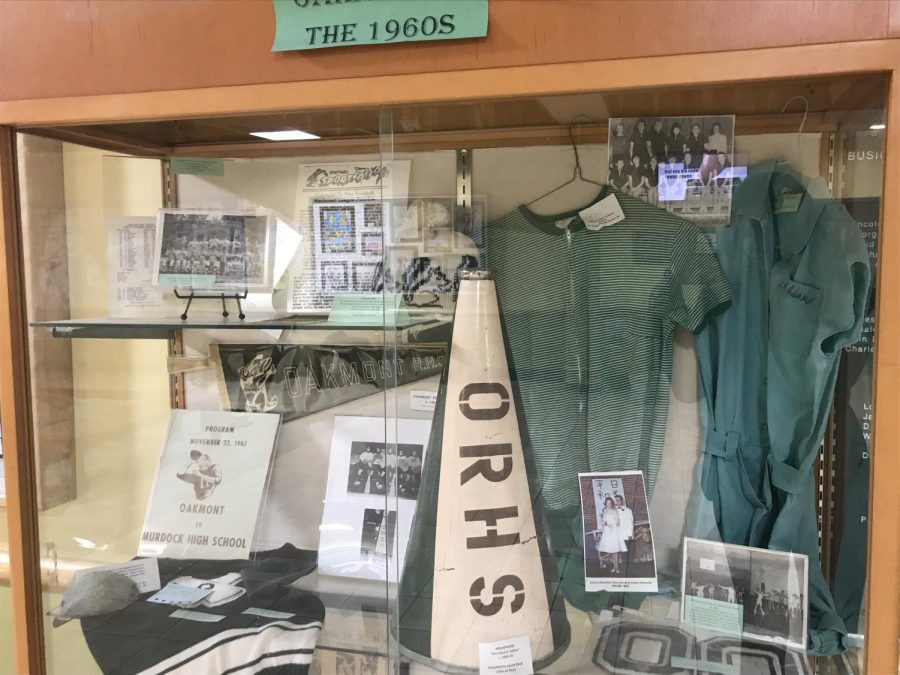 Oakmont appreciates its female sports history with a display of past uniforms. 