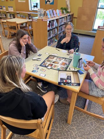 Students opt to play Clue in the Library...who did it?!