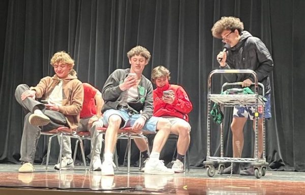 Liam, Cooper, Sam, Zavian, Connor, James, and Isac performing Carpool Tunnel