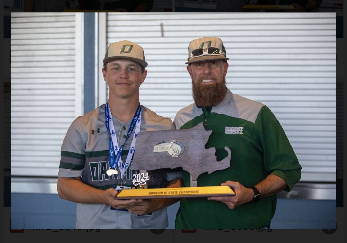 LeBlanc and Cauoette pose with 2nd straight championship trophy at Polar Park after 2024 state final game. 