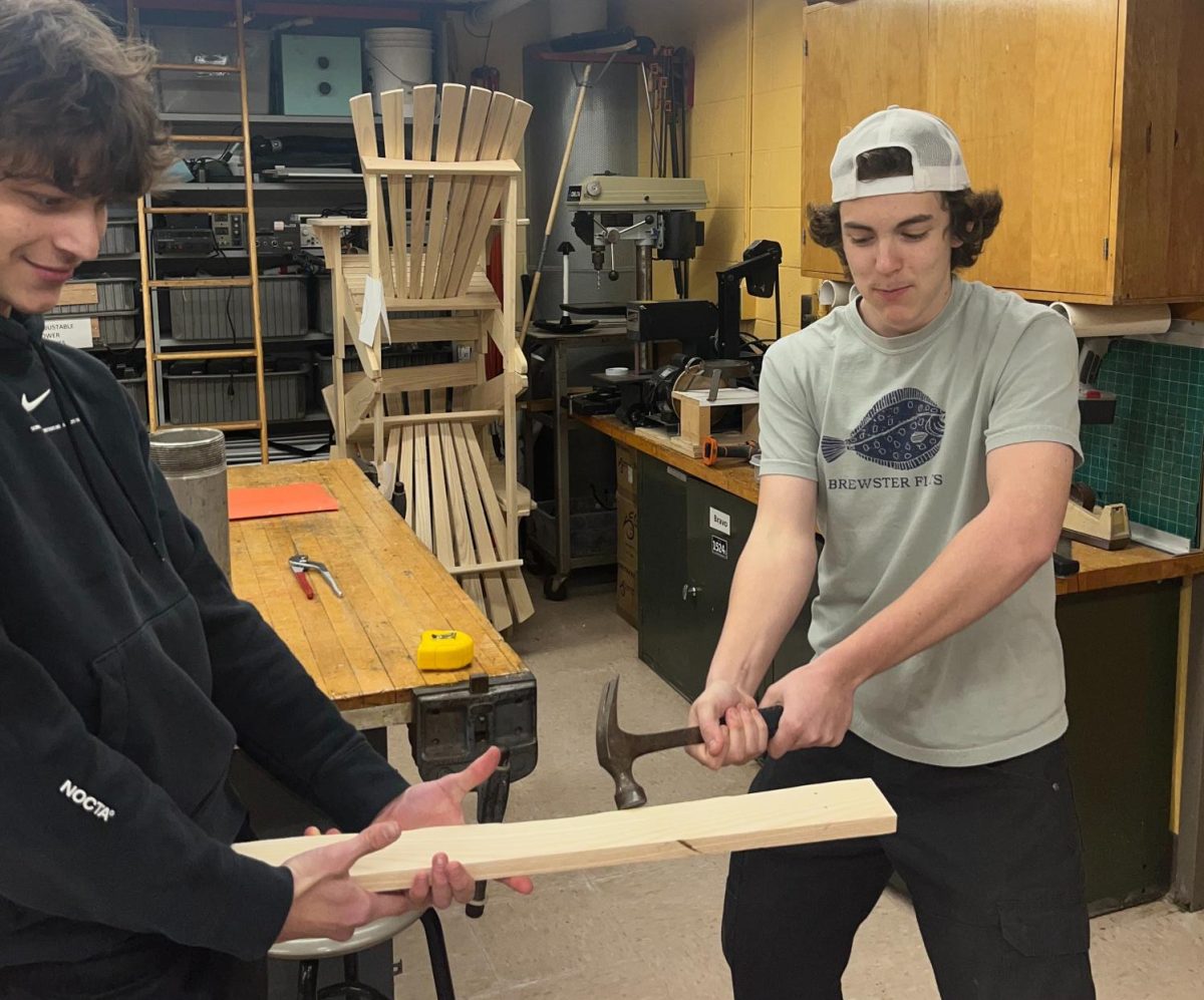 Jack Bennett and Tony Vallara practicing their woodworking skills.