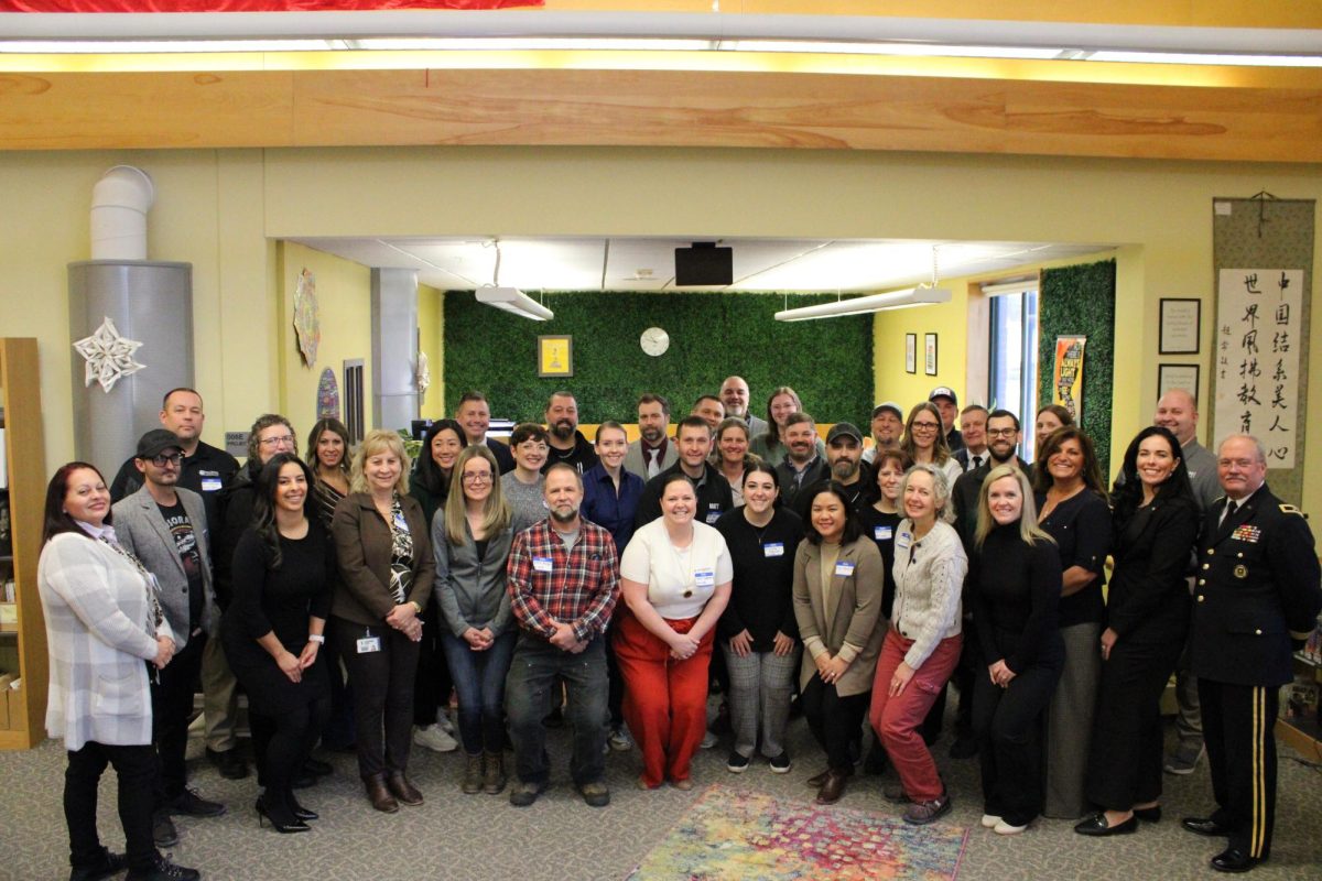 Career Days guest speakers group together for a picture.