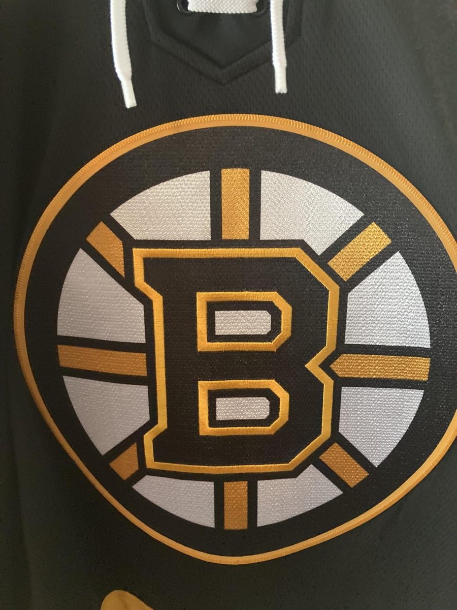 Local Connor Catalfamo sports the black and yellow Bruins logo