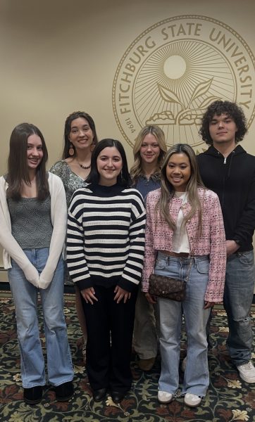 Oakmont writers pose at awards ceremony.