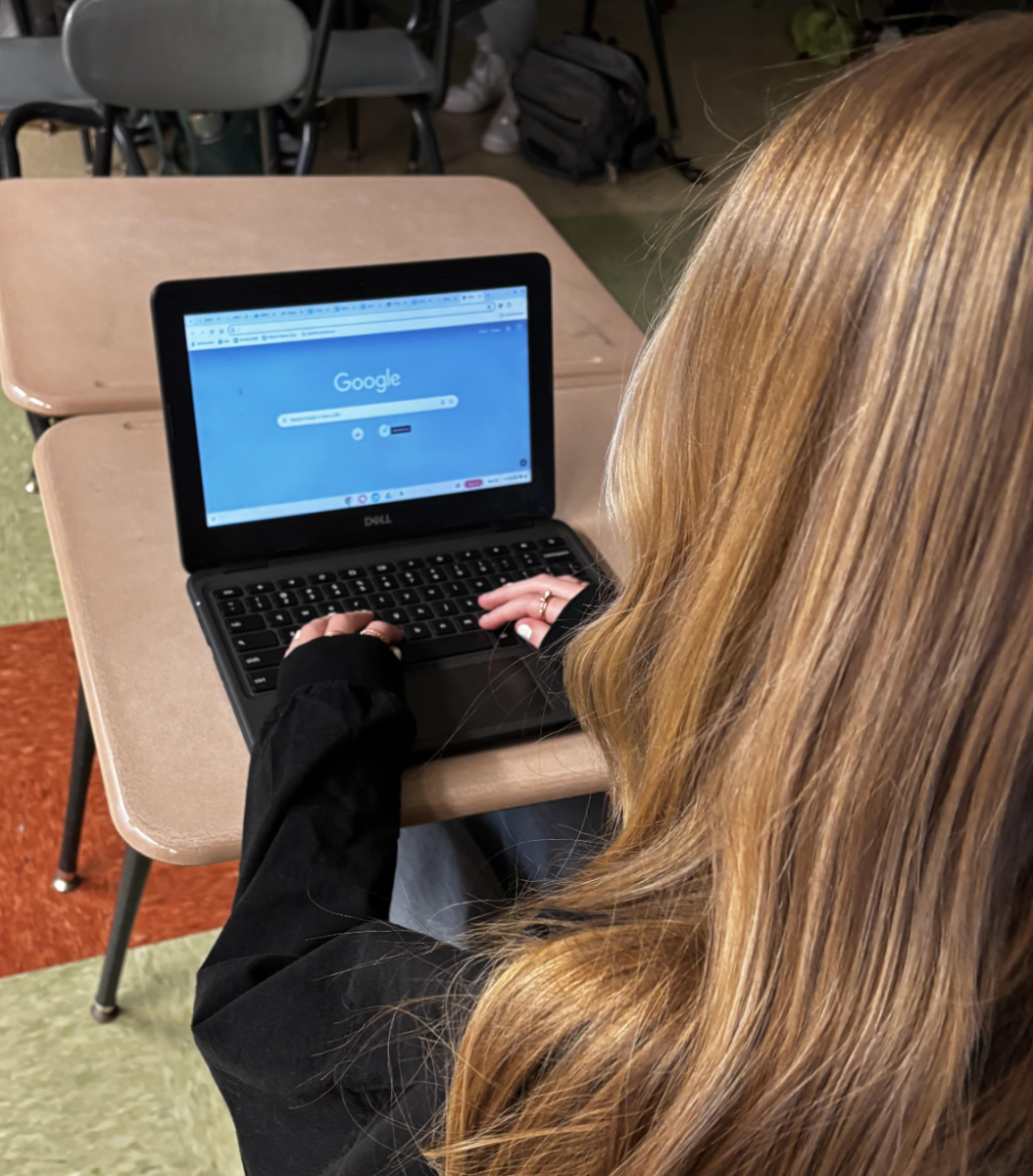 A student hard at work, preparing for MCAS