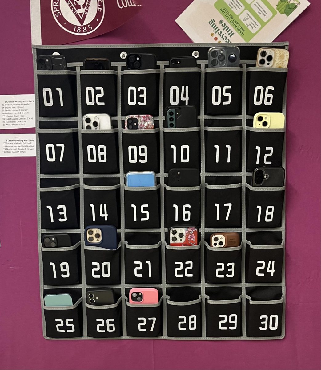 Phone caddy hung up in Mr. Mark Nevard's classroom to contain students phones