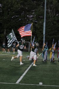 Spartans proudly representing their team and country. 