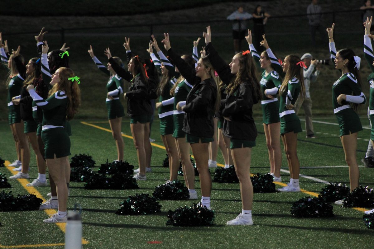 Spartan Cheer-leading team, motivating the football team to victory!