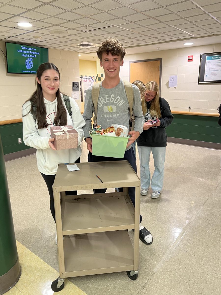 Jayden Brostrom and Megan Vance push raffle at 4 Corners.