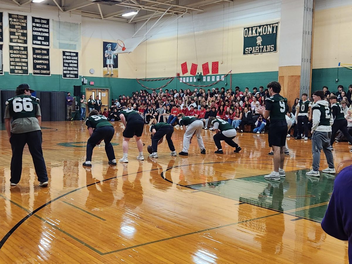 Football team shows off their winning play.