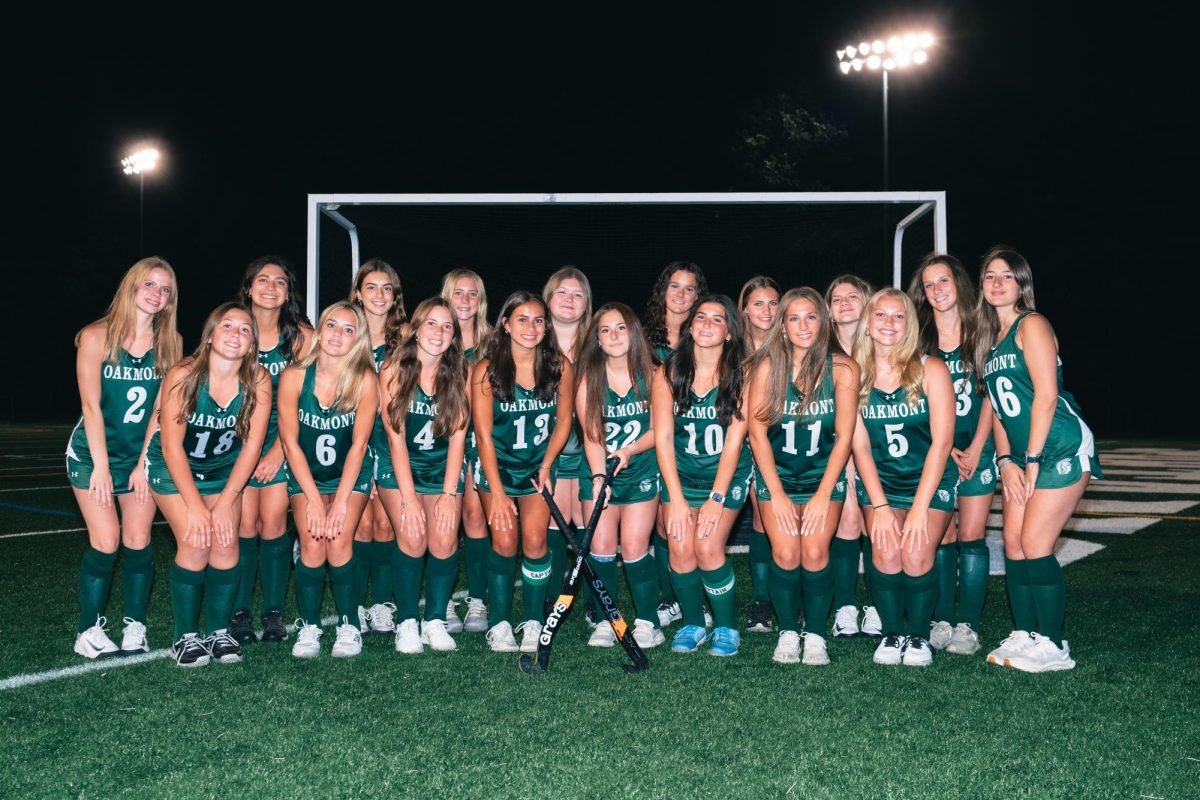 Oakmont Varsity Field Hockey flexes on Media Night.