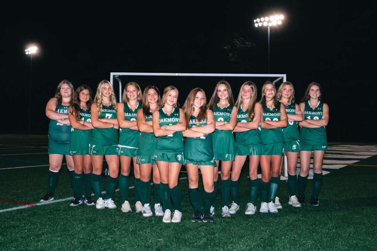 Oakmont JV Field Hockey Team under the lights,