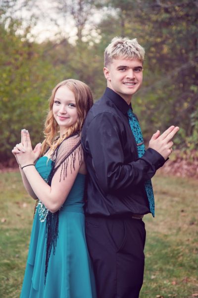 Couple posing for homecoming photo