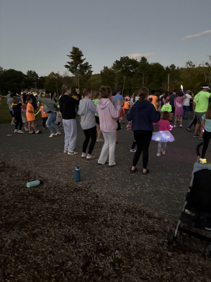 Peer Leaders volunteering at Briggs Glow Night 