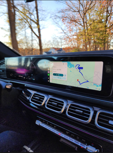 Picture of my Mother using Google maps from her car, to give us directions home.