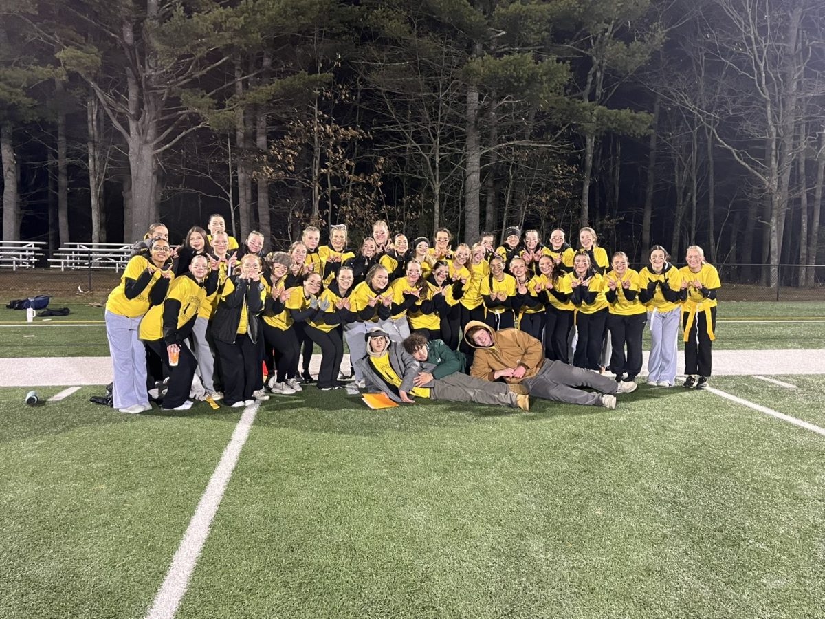 Junior powderpuff team taking a picture after their win!