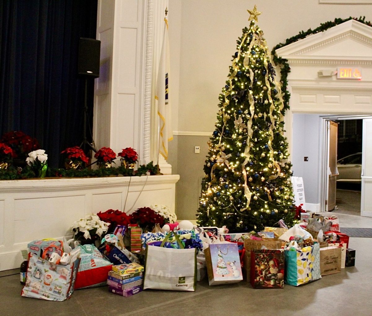 Under the tree lies only a small portion of the total toys donated by the women in this group!