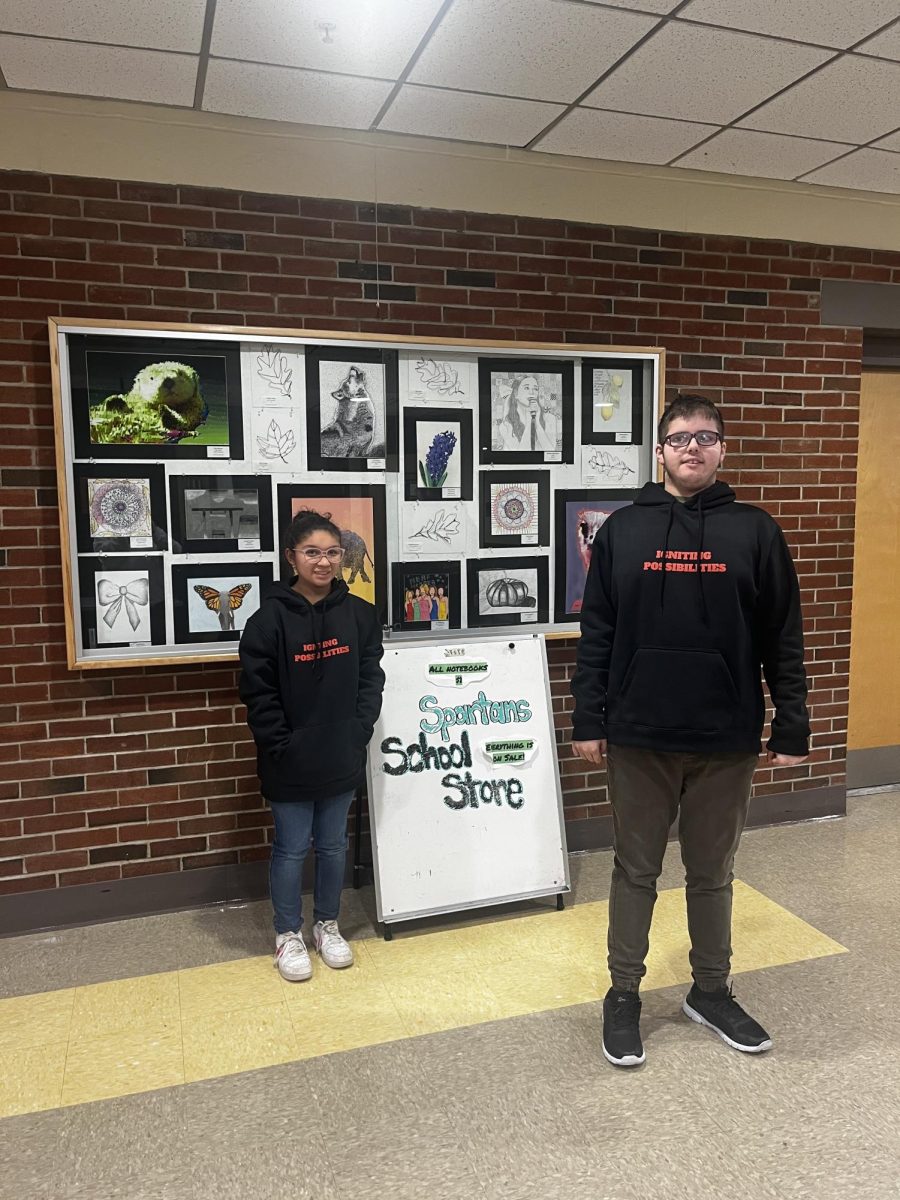 Jasllyn and Cody helping out with the school store