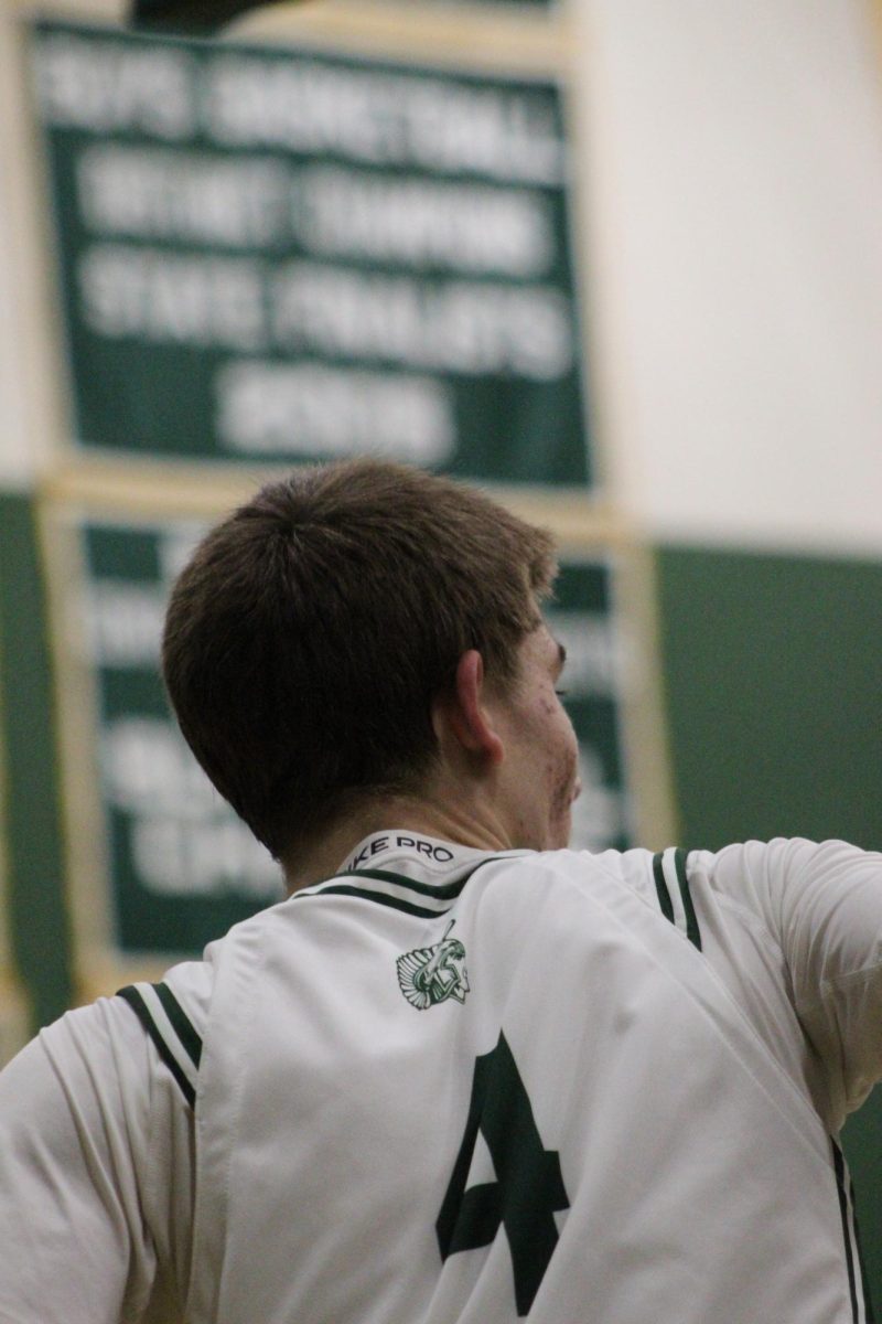 Donovan O'Shaughnessy with a banner background