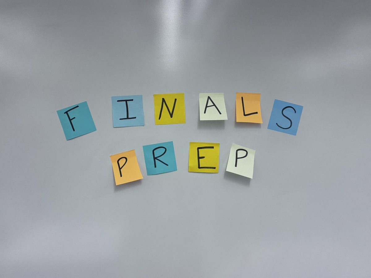 "Finals Prep" sticky notes on the whiteboard.