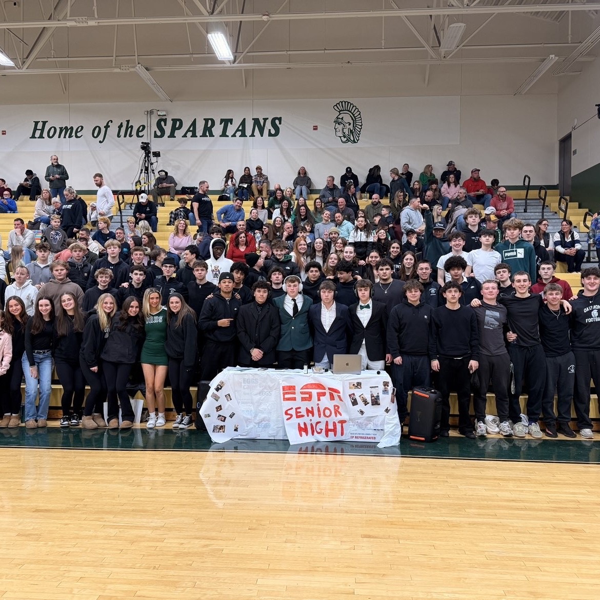 Spartan Nation gathers around Spartan Center Press Desk. 