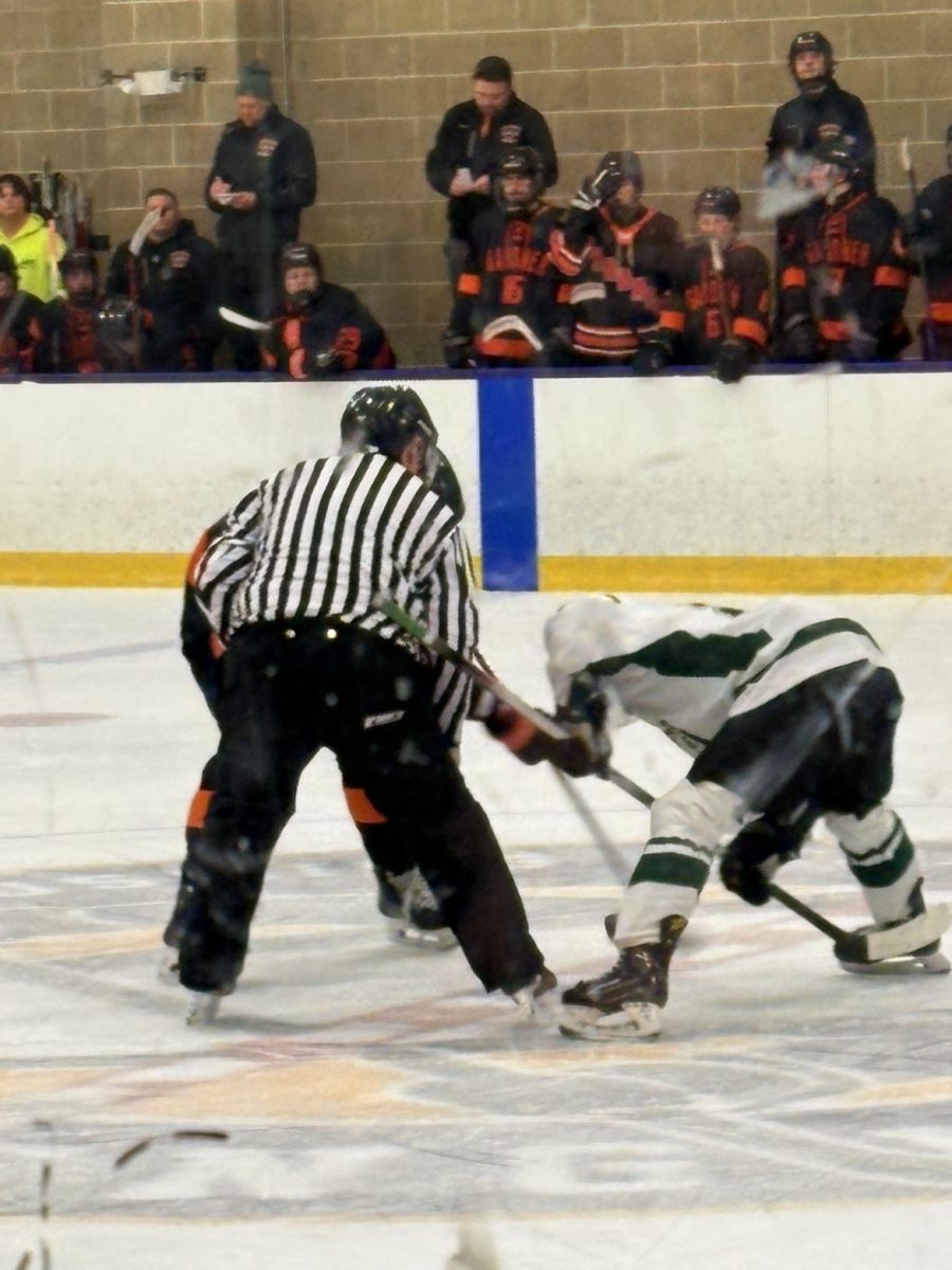 Opening faceoff Oakmont vs. Gardner on senior night.