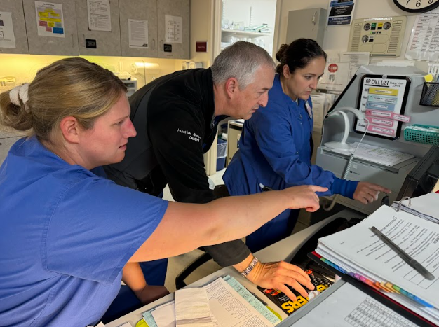 Dr. Groggins and RNs Lucier and Sunderland discuss fetal tracking. (Photo submitted with permission by Heywood Hospital nurse Kate DesBois.)
