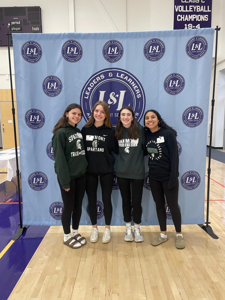 Grace Hill (left) Lucy Davieau ( Middle Left) Audrey Berg (Middle Right) Abigail Suarez (Right) attend the 2026 Girls Leadership Summit at Cushing.
