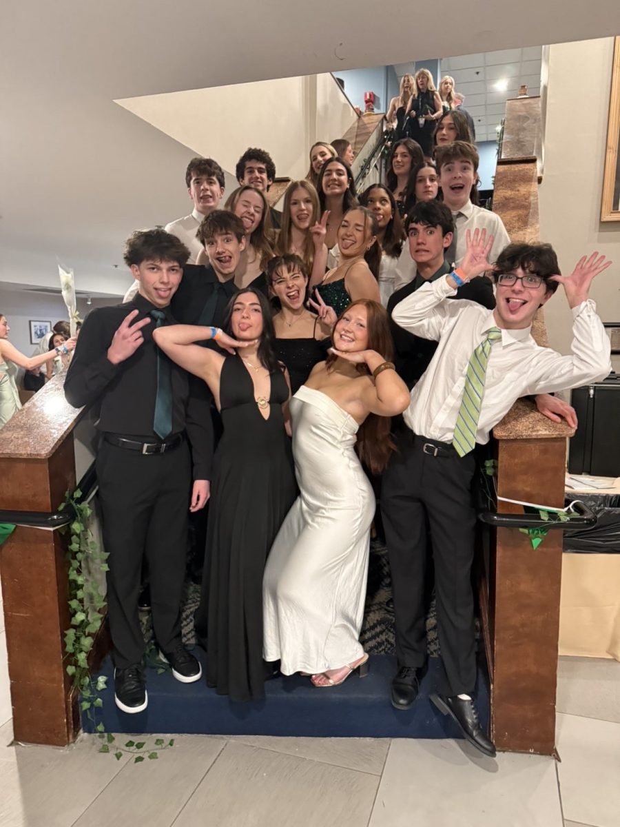StuCo wearing formal dress and making funny faces before their banquet (Submitted with permission by Daniel Dufour)