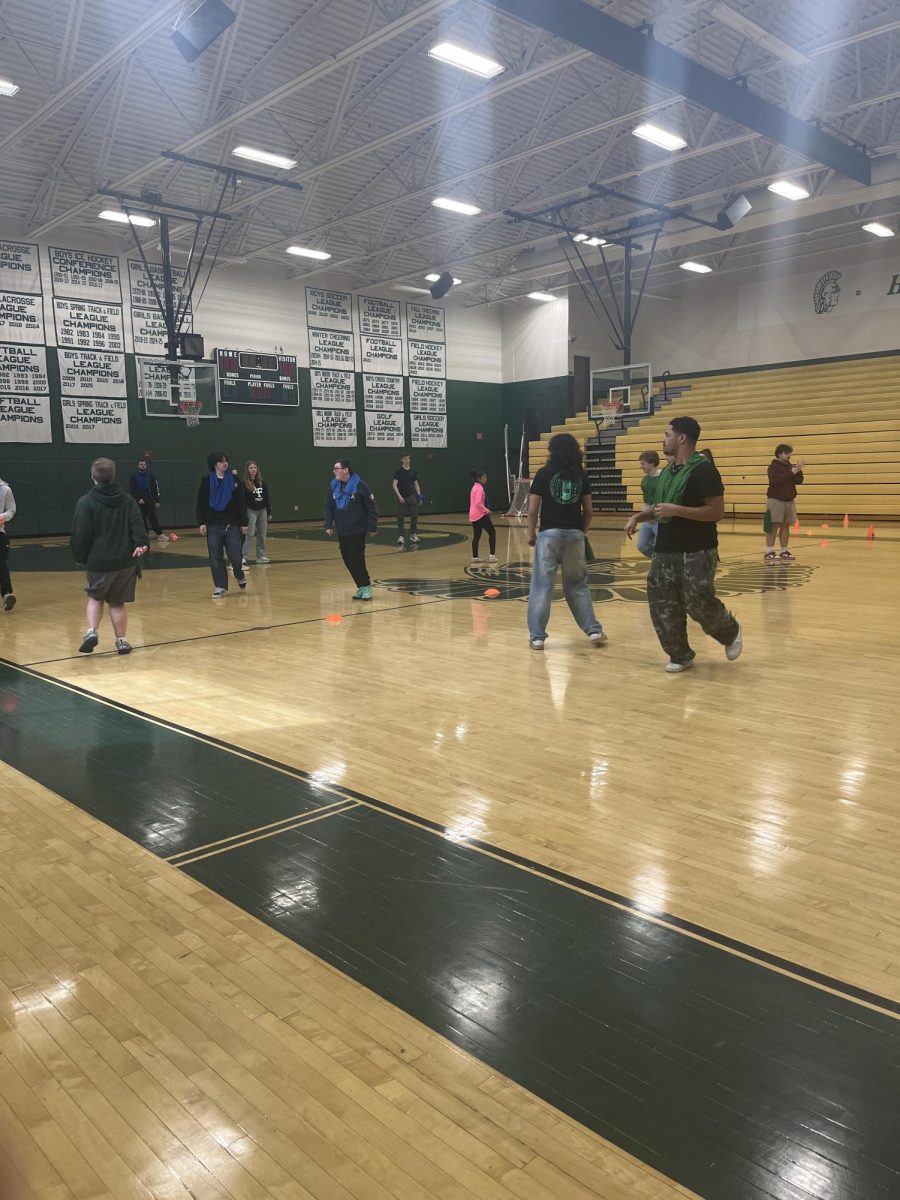 students getting ready for their time playing flag football 