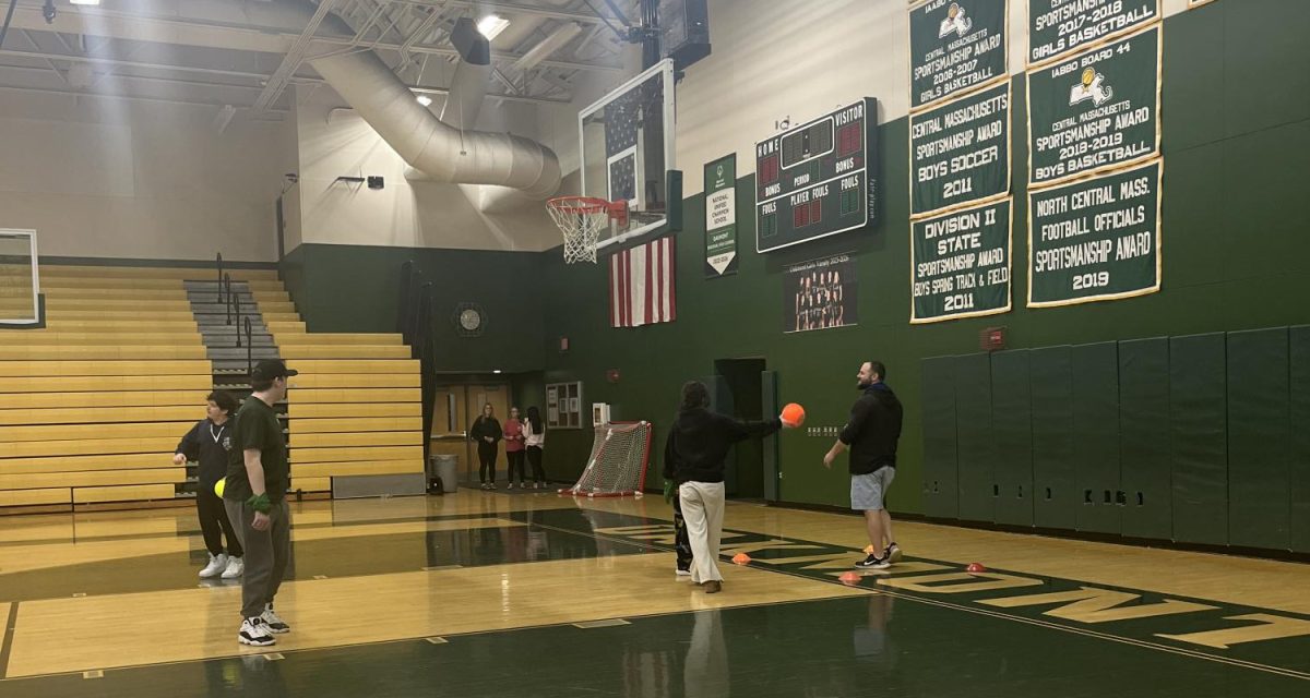 Unified gym class participating in capture the flag.