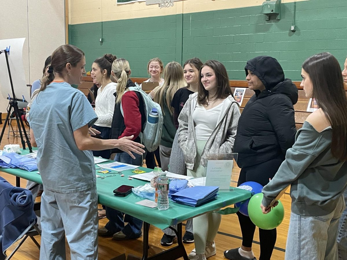 The Traveling Nurse teaching students what her job encapsulates!