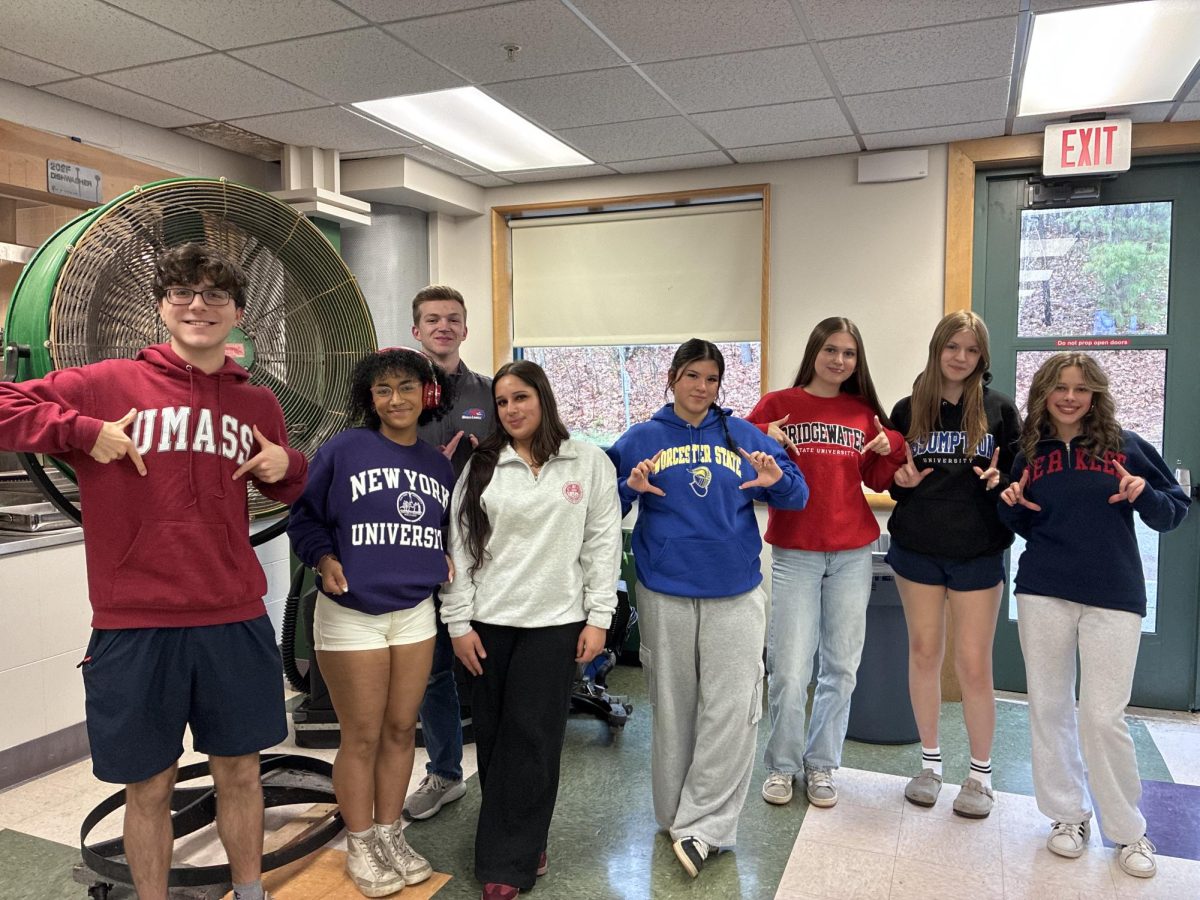 Members of the senior class decked out in their college gear on decision day.