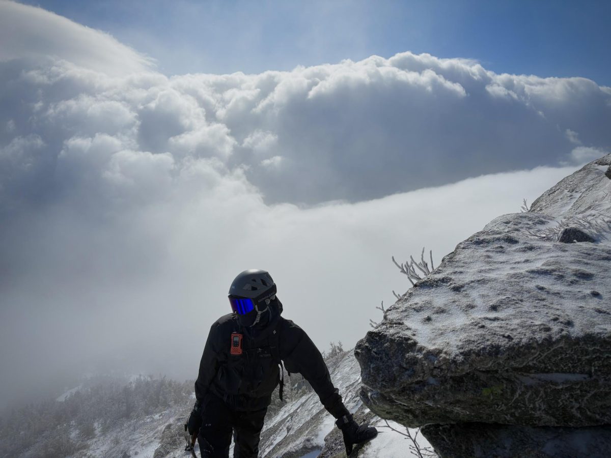 Oakmont senior Sam Belcher enjoys a momentary break from his climb. Leaning against The Lion's Head on Mt. Washington at over 5,000 ft, he knows his ascent is almost over. (Photo taken March 21, 2026) 
