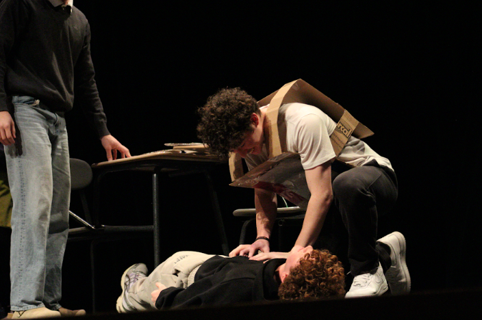 Students March Madness performance about someone getting an allergic reaction in a restaurant and an EMT that helps.
