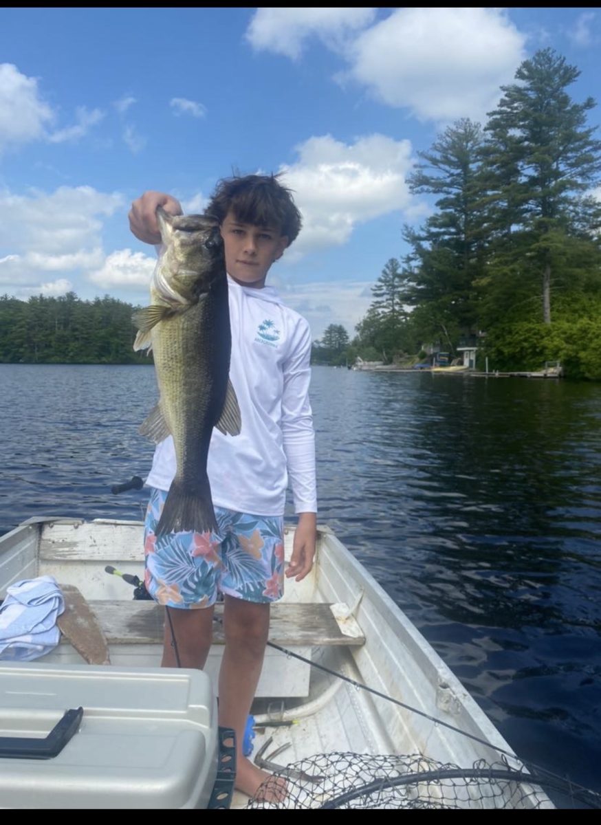 Kellan O'Day poses with his largemouth bass. 