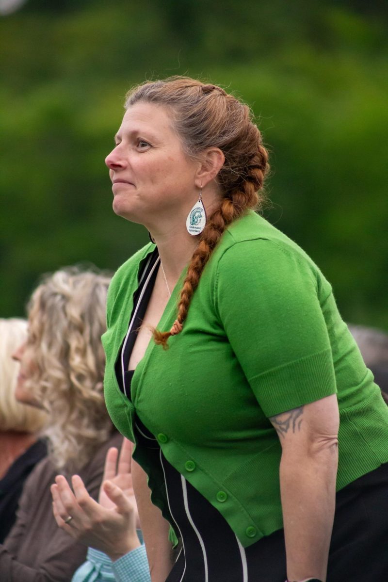 Staff member and parent Jodie Feeley cheers her daughter on during the ceremony.
