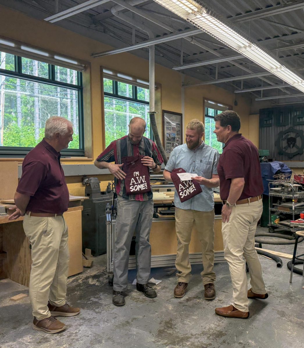 Oakmont teachers Peter Jones, Alex Thibeault, and Greg Secino who is not present, being recognized after receiving a Grant for a Laser Engraver.