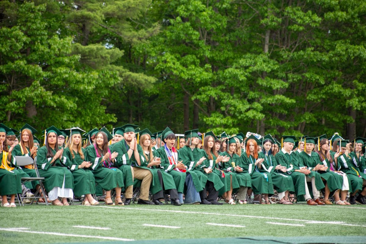 Oakmont senior Class of 2026 clapping for Cameron Scerbo after his speech. 